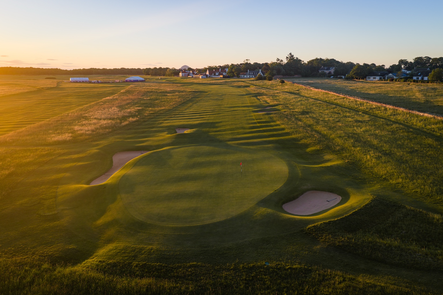 Golf course photographed in warm golden hour light